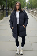 1757425431_Black-Hooded-Longline-Puffer-Coat-1.jpg