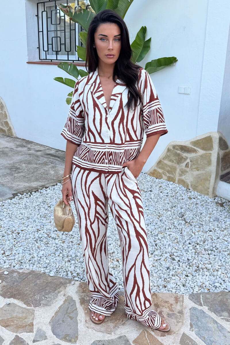 1771600507_Cream-And-Brown-Abstract-Print-Wide-Leg-Trousers-1.jpg